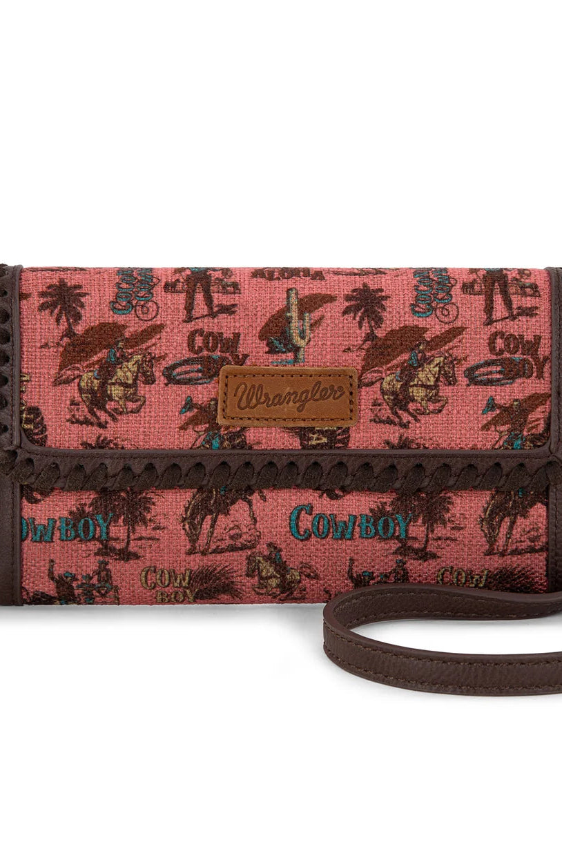 Trestles Clothing Company retro cowboy print crossbody wallet in pink canvas and brown PU leather with whipstitch trim